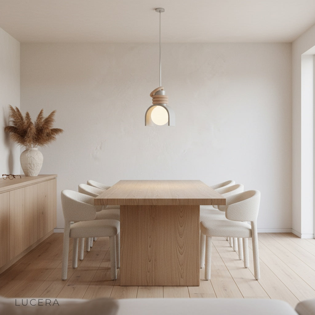 Fornax Dome Pendant Light illuminating a cozy contemporary bedroom corner at dusk