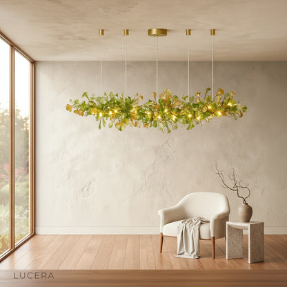Paola chandelier illuminated in bright daylight hanging in minimalist living room