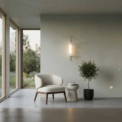 elegant wall light above a sofa in a modern lounge setting