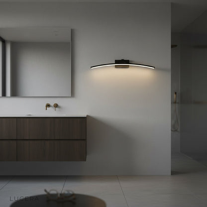 elegant ginkgo wall lamp above bedside table in cozy bedroom with neutral tones