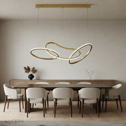 nighttime lifestyle shot of Yakitori LED chandelier casting sculptural shadows on wall