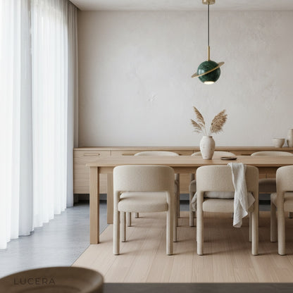 marble pendant light glowing softly in modern bedroom at dusk