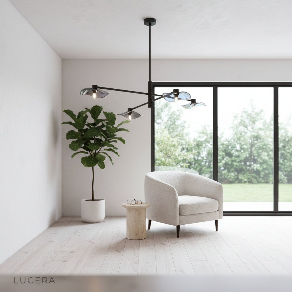 Hansa yellow chandelier hanging above dining table with minimalist decor