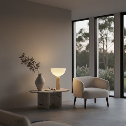 Close-up of Tristan Table Lamp travertine stone texture and glass shade detail