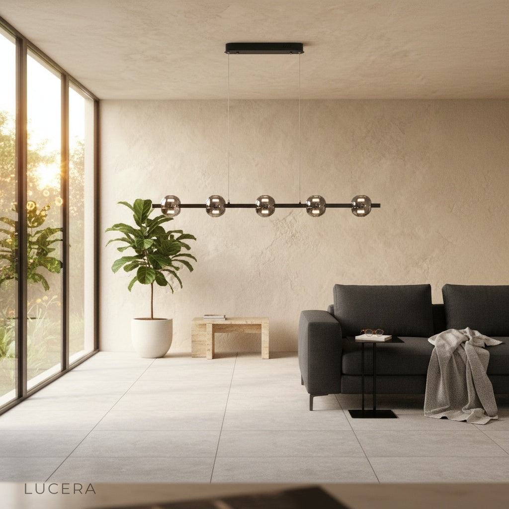 Gioia chandelier in matte black finish suspended over stylish salon interior