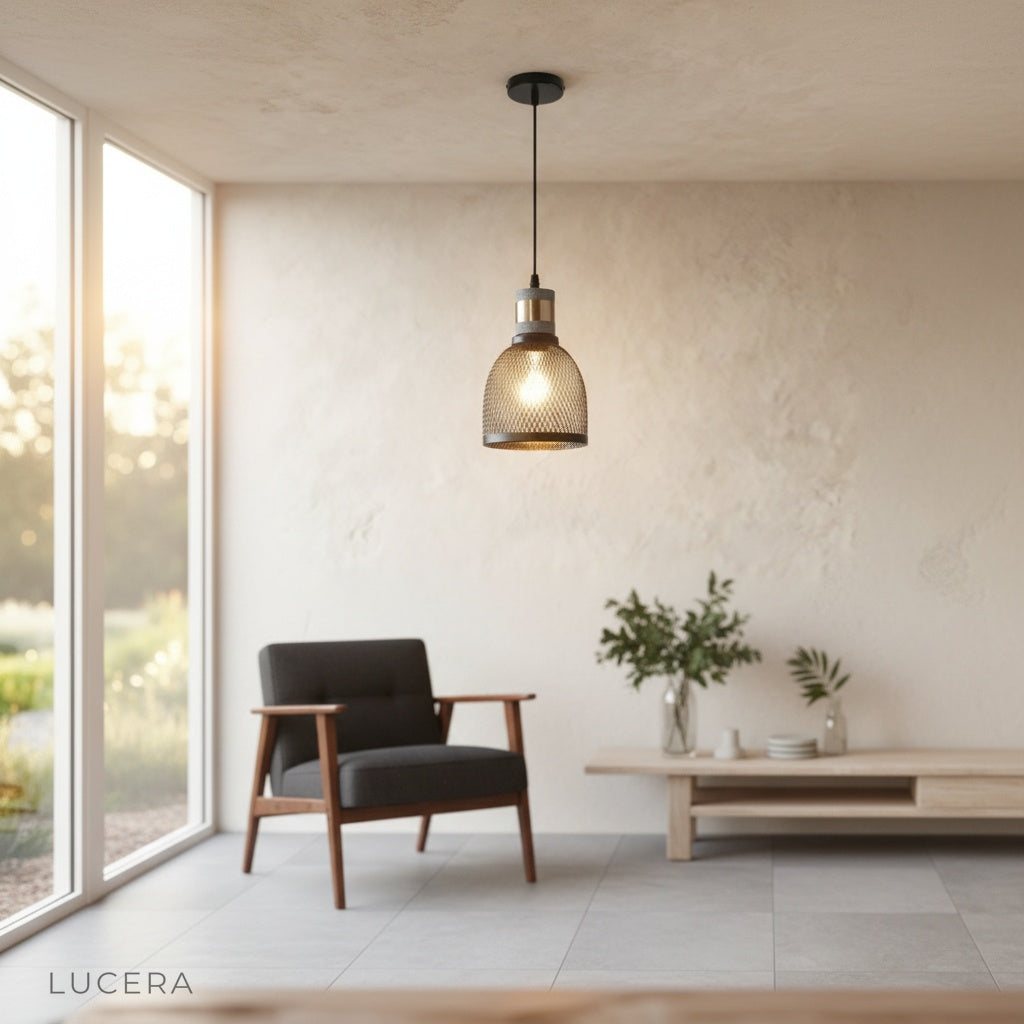 compact Pontiff pendant light above small reading nook with armchair and lamp