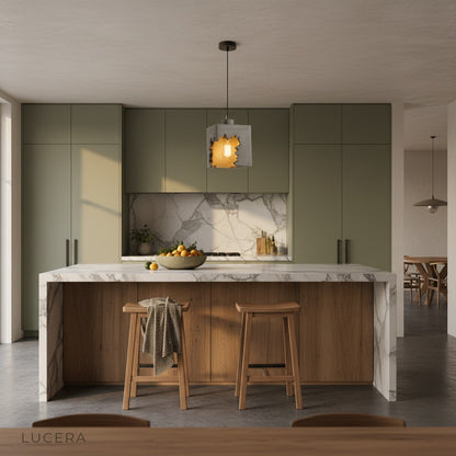 Enthrall pendant light glowing at dusk in a cozy living room with exposed brick