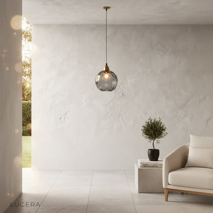 Kronos pendant light single head in minimalist hallway, soft daylight from window