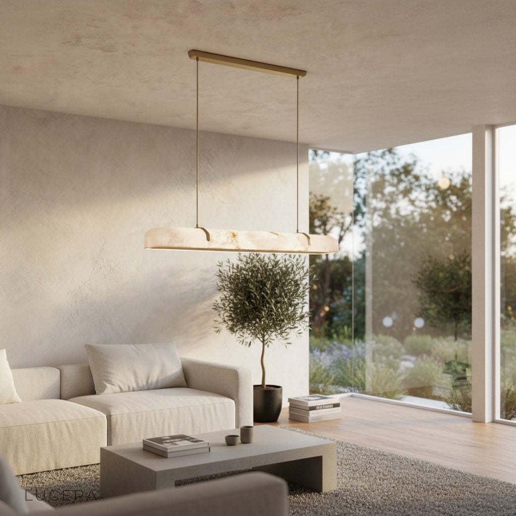 evening shot of Nerissa chandelier casting warm light in a cozy modern bedroom