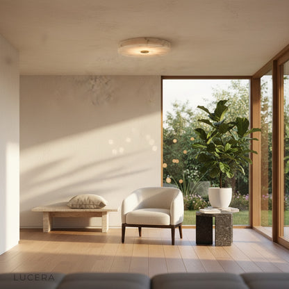 ceiling light casting soft ambient light in cozy bedroom at dusk