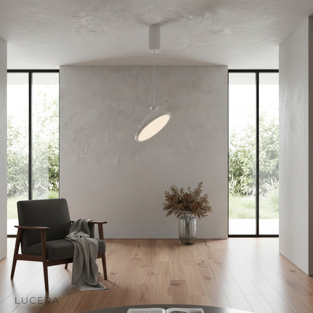 wulfenite pendant light at dusk casting soft light over dining table with minimalist decor