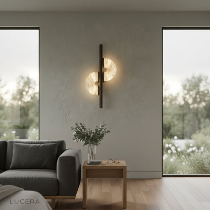 elegant hotel hallway with Inception alabaster wall lamp illuminating corridor