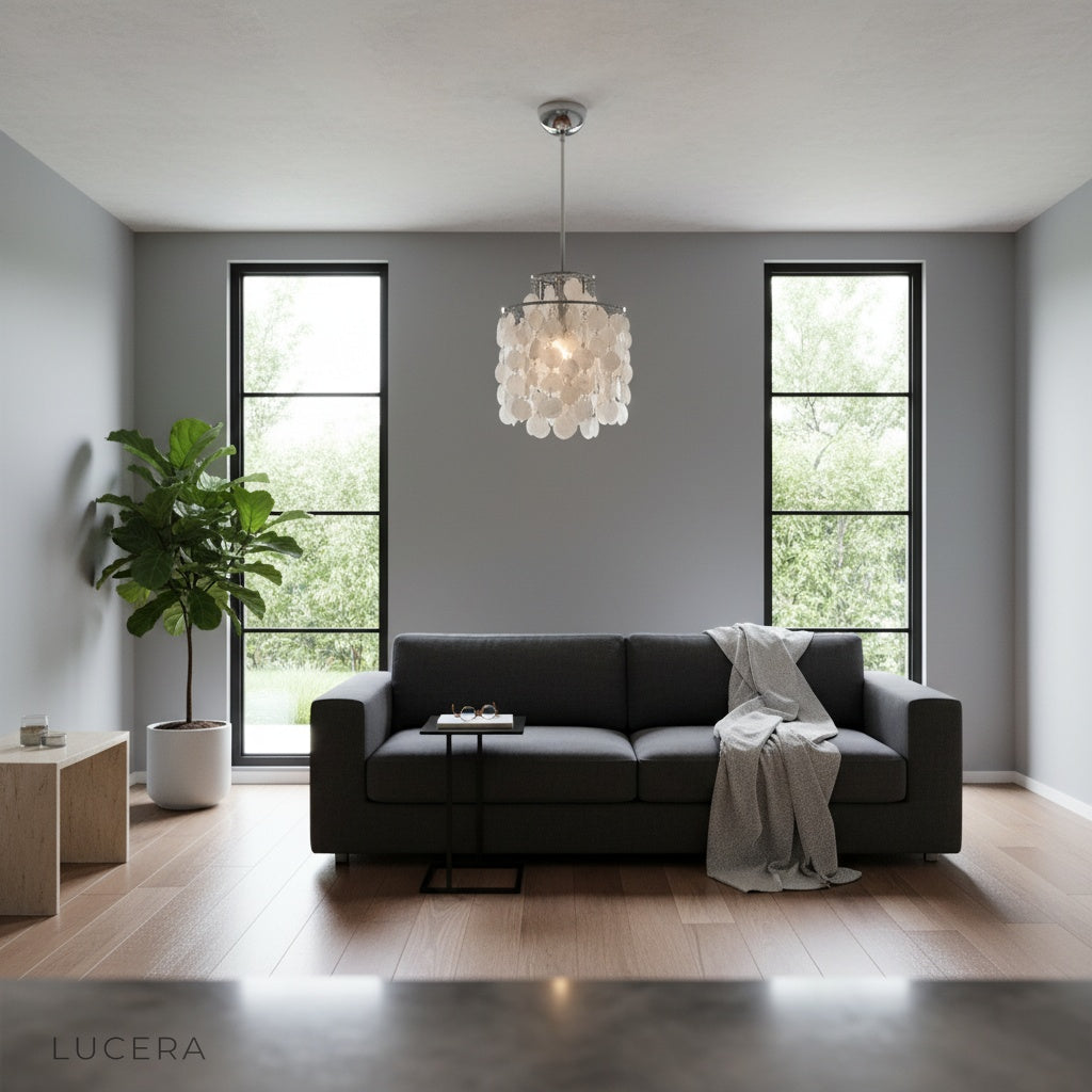 Zwing Chandelier hanging in a boho chic living room at dusk with candles and macrame accents