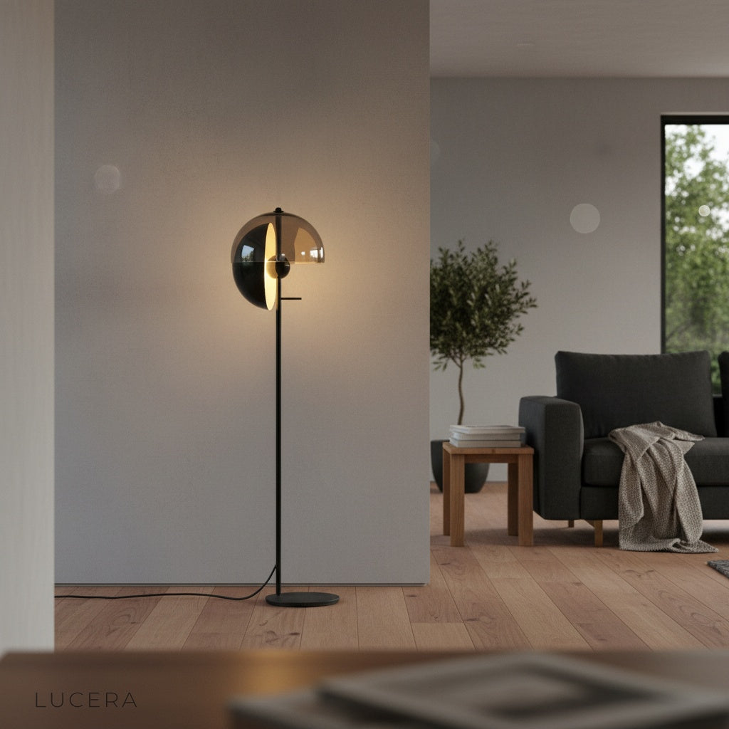 Oubliette Floor Lamp glowing at dusk in contemporary bedroom setting