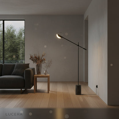 Sculptural Memento Floor Lamp in a dark corner with soft ambient lighting for evening mood