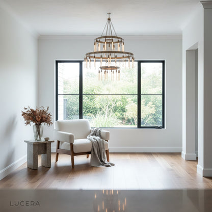 Wreathe 3-tier chandelier glowing warmly in dining room with mid-century decor
