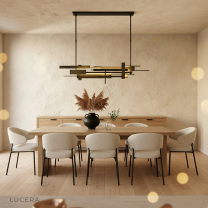 Cassiopeia chandelier in cozy reading nook with warm glow and bookshelves