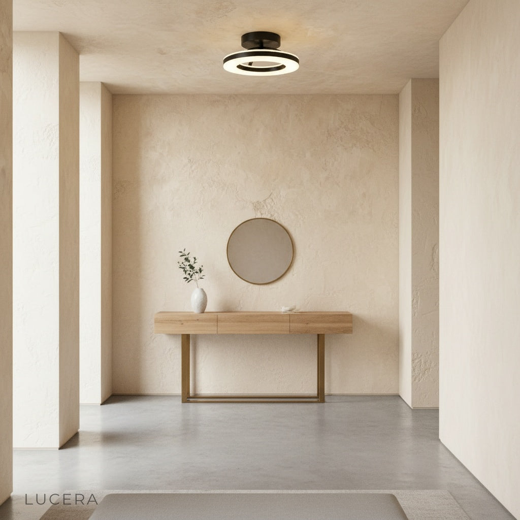 Ziggurat ceiling light in a cozy bedroom with warm bedside tones