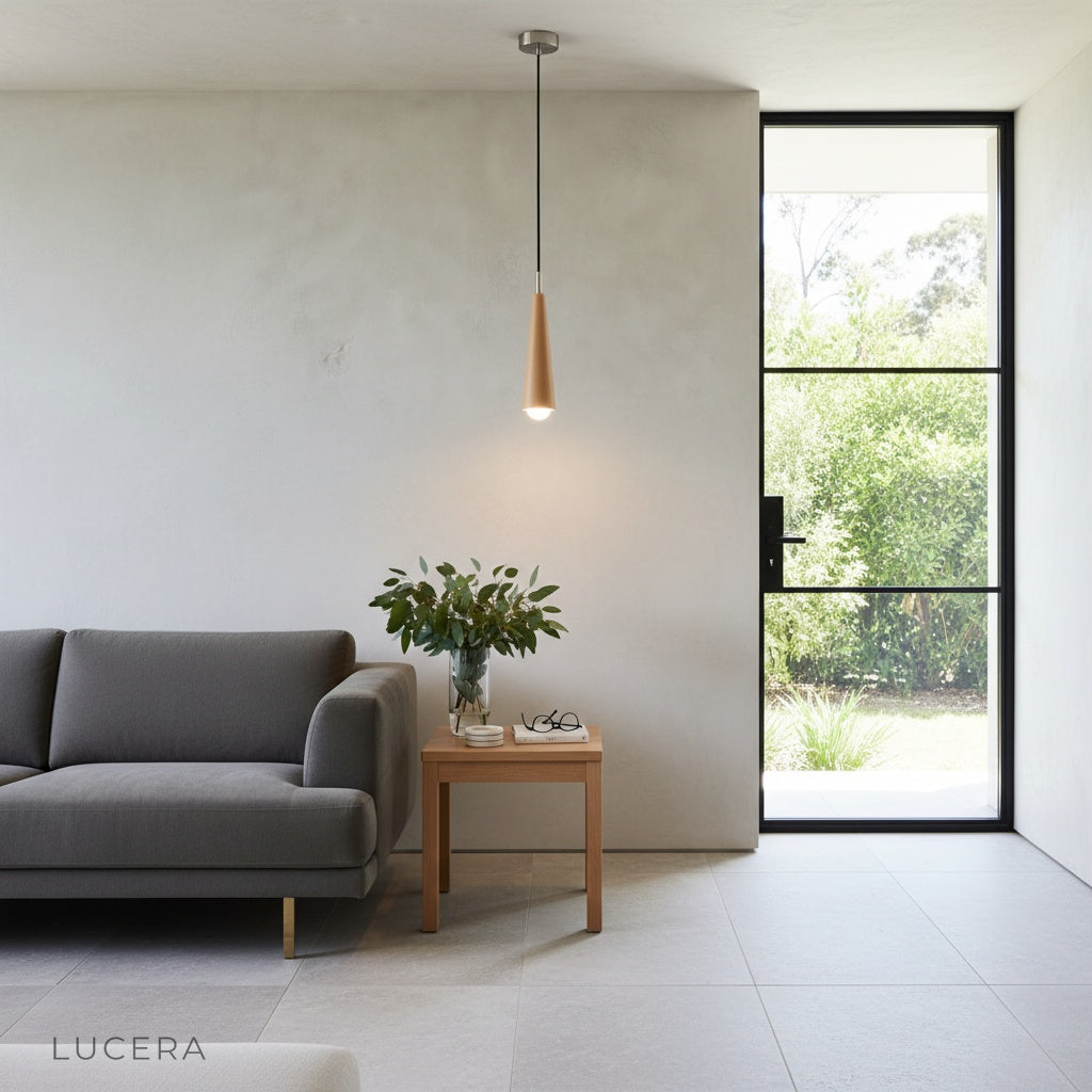 Close-up of walnut wood Monk pendant light showing copper accents and conical shade details