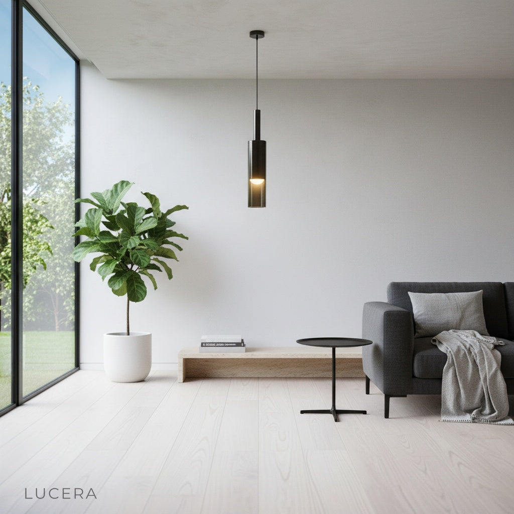 Close-up of Nebulous pendant light showing black glass and iron details