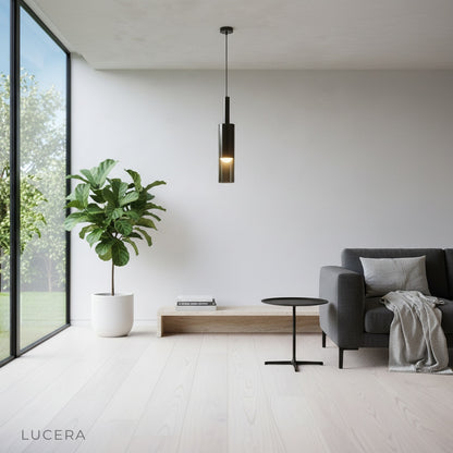 Close-up of Nebulous pendant light showing black glass and iron details