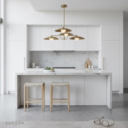 Stellar Brass Chandelier casting warm light over a minimalist bedroom nightstand