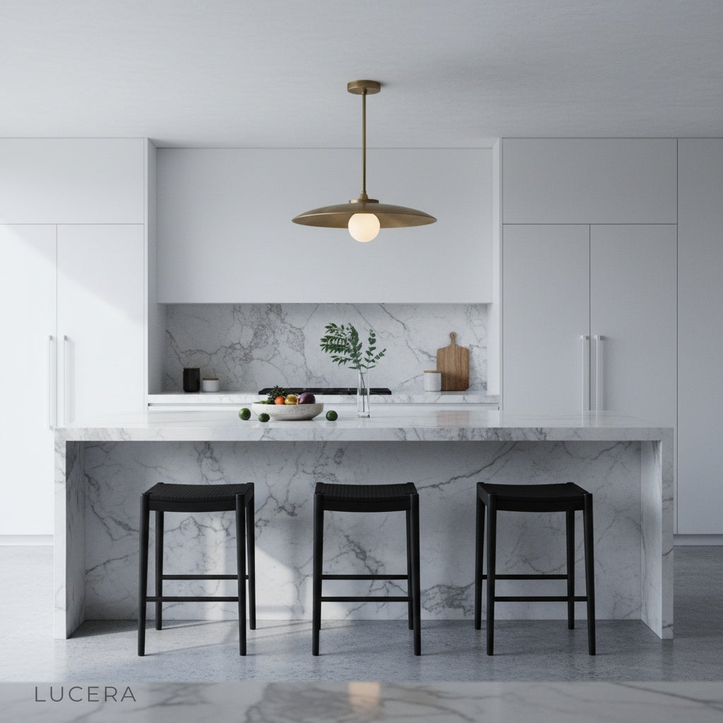 Brass Sylvaine pendant light in a contemporary living space with neutral decor