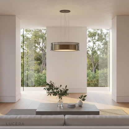 Kismet Pendant Light casting soft ambient glow in luxurious lounge setting