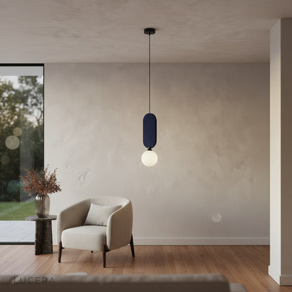 Karat pendant lamp in entryway with soft shadows and contemporary wall art