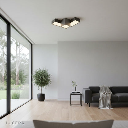 Nighttime lifestyle shot of sculptural light in stylish home office