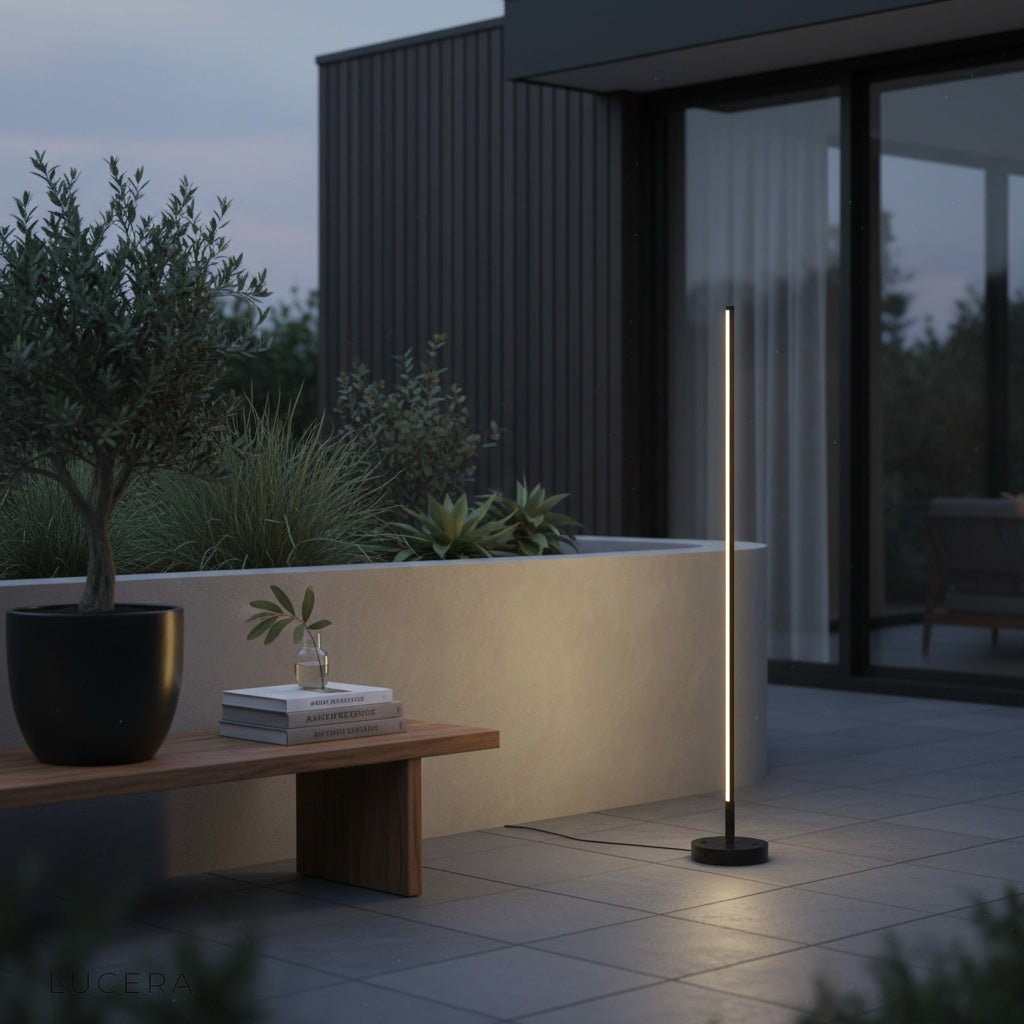 wire-free outdoor lamp casting warm light along a garden path at night