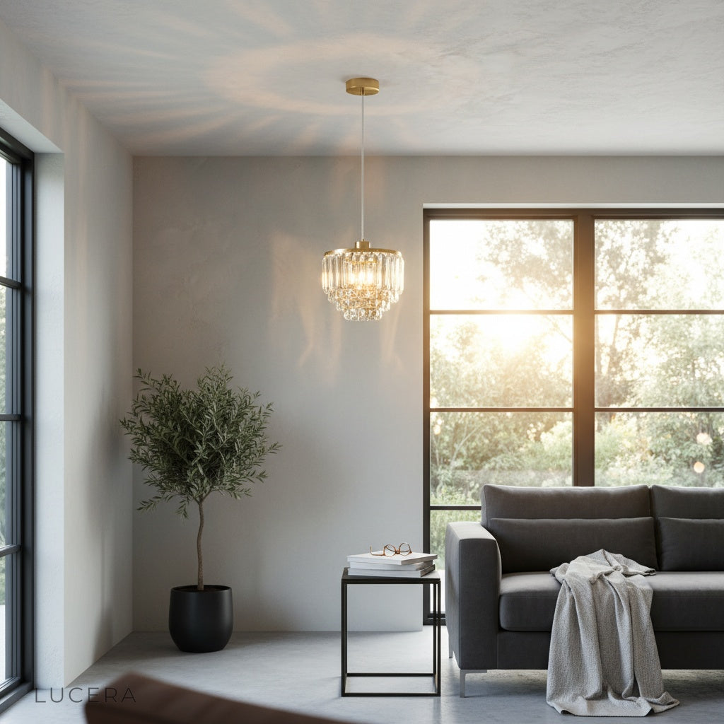 Diamond pendant light glowing at dusk in contemporary lounge with soft shadows