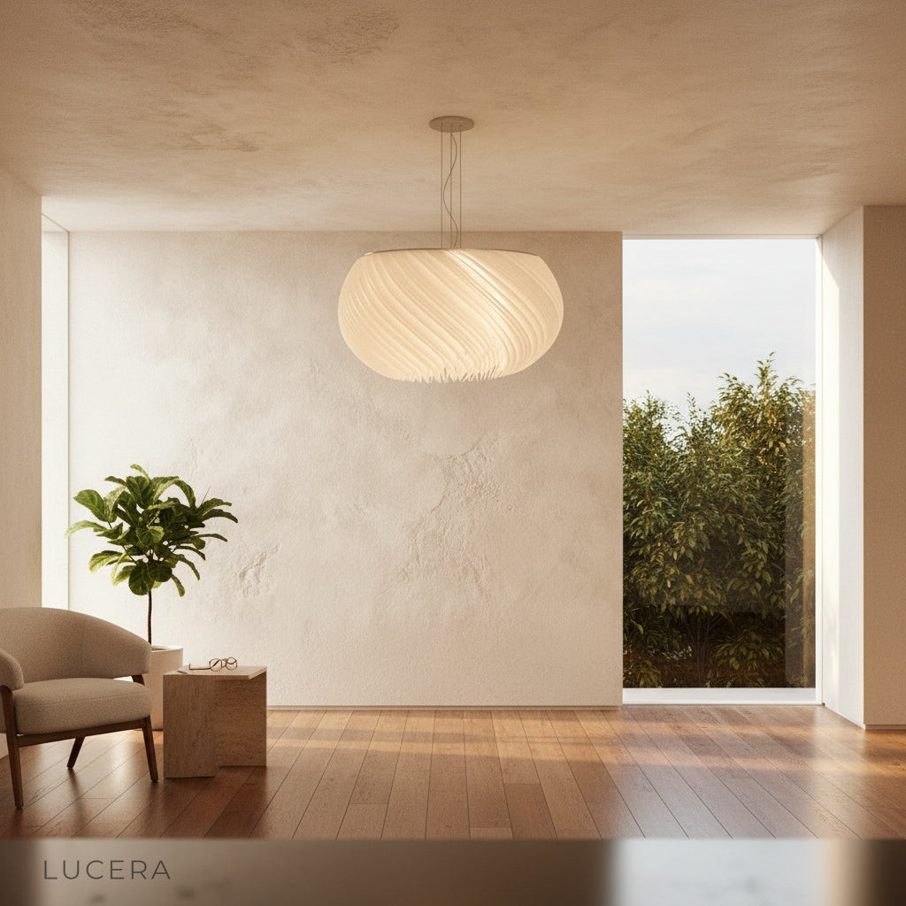 Theron chandelier side profile in bright studio showing layered white materials