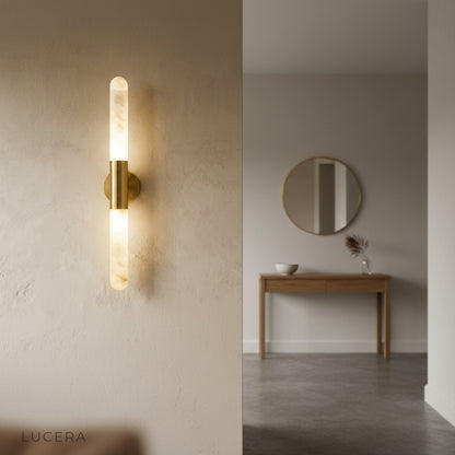 ambient nighttime shot of Zone Wall Lamp casting soft light in a modern living room
