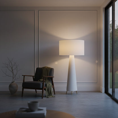 Quarters Floor Lamp in a sunlit reading corner with fabric shade and base complementing neutral decor tones