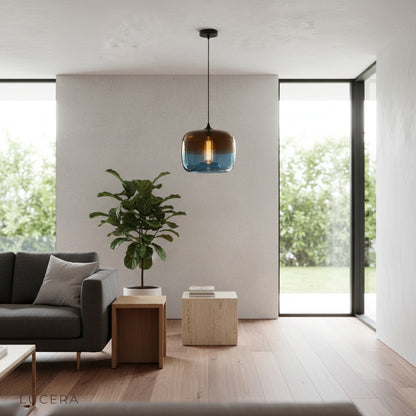 Minerva pendant light casting warm ambient glow in cozy evening living room