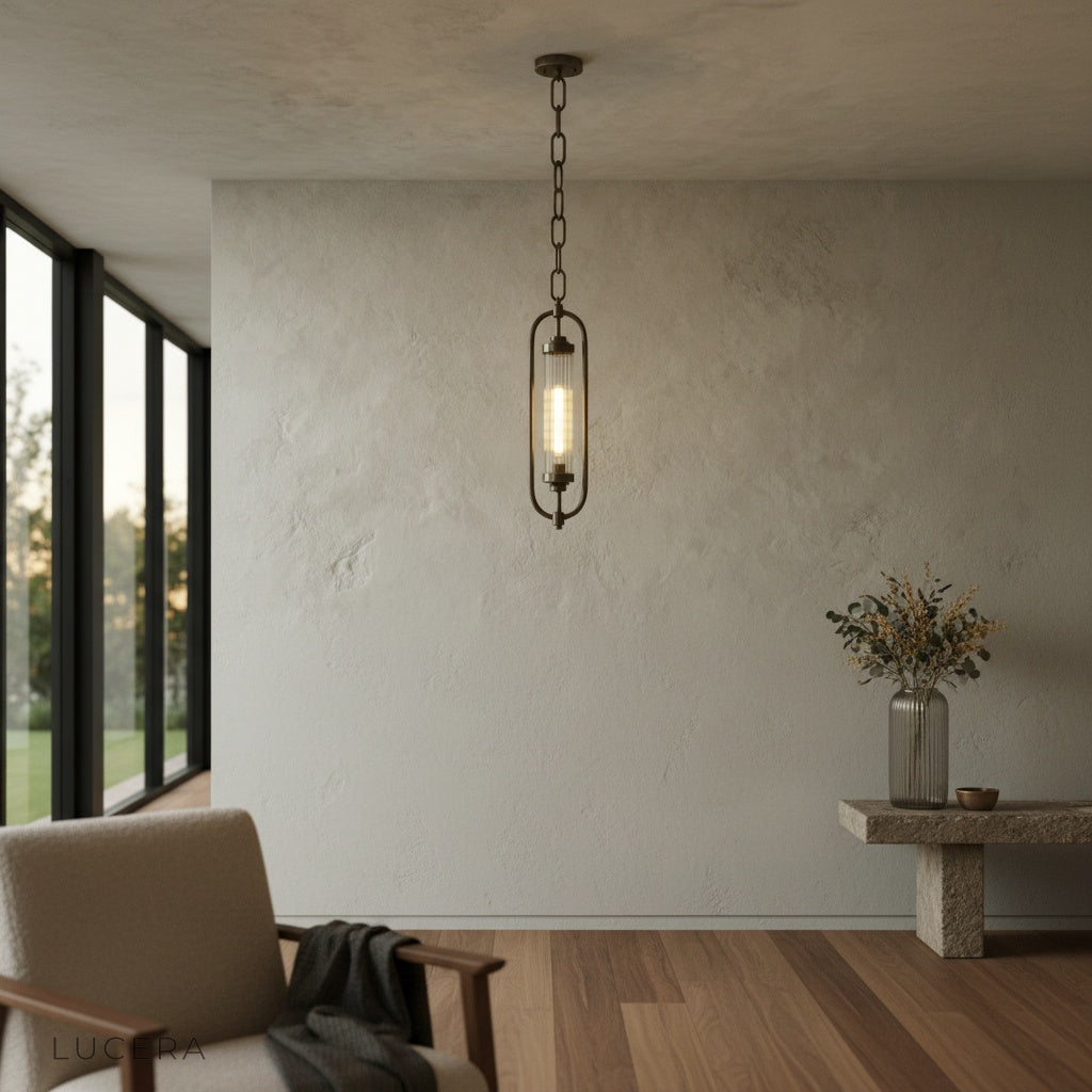 Zigzag Lucis lamp hanging over kitchen island with warm glow and modern interior decor