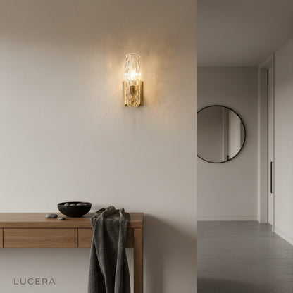 Jubilant Wall Lamp illuminated at dusk in cozy bedroom setting