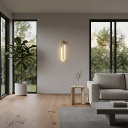 Ximena Wall Lamp soft glow casting rhythmic shadows on wall