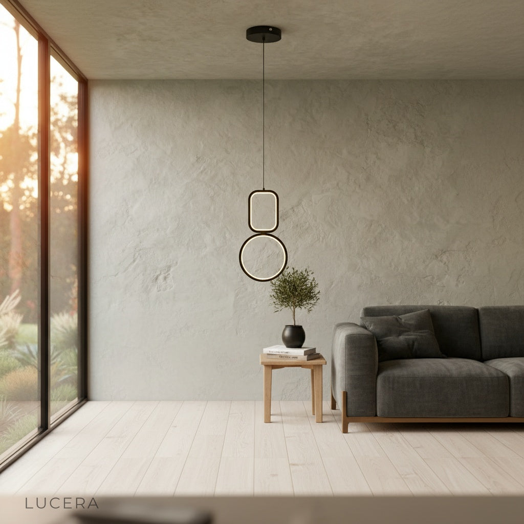 Facade pendant light as focal point in high-ceiling entryway with soft lighting