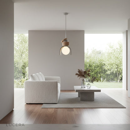Ambient nighttime shot of Fornax Dome Pendant Light casting soft diffused glow in minimalist hallway