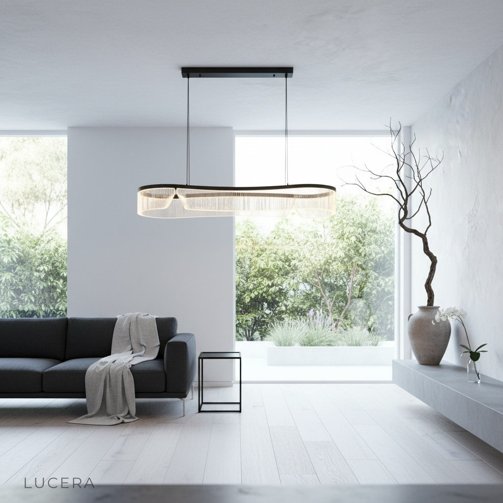 translucent chandelier illuminating contemporary kitchen island with warm ambient lighting