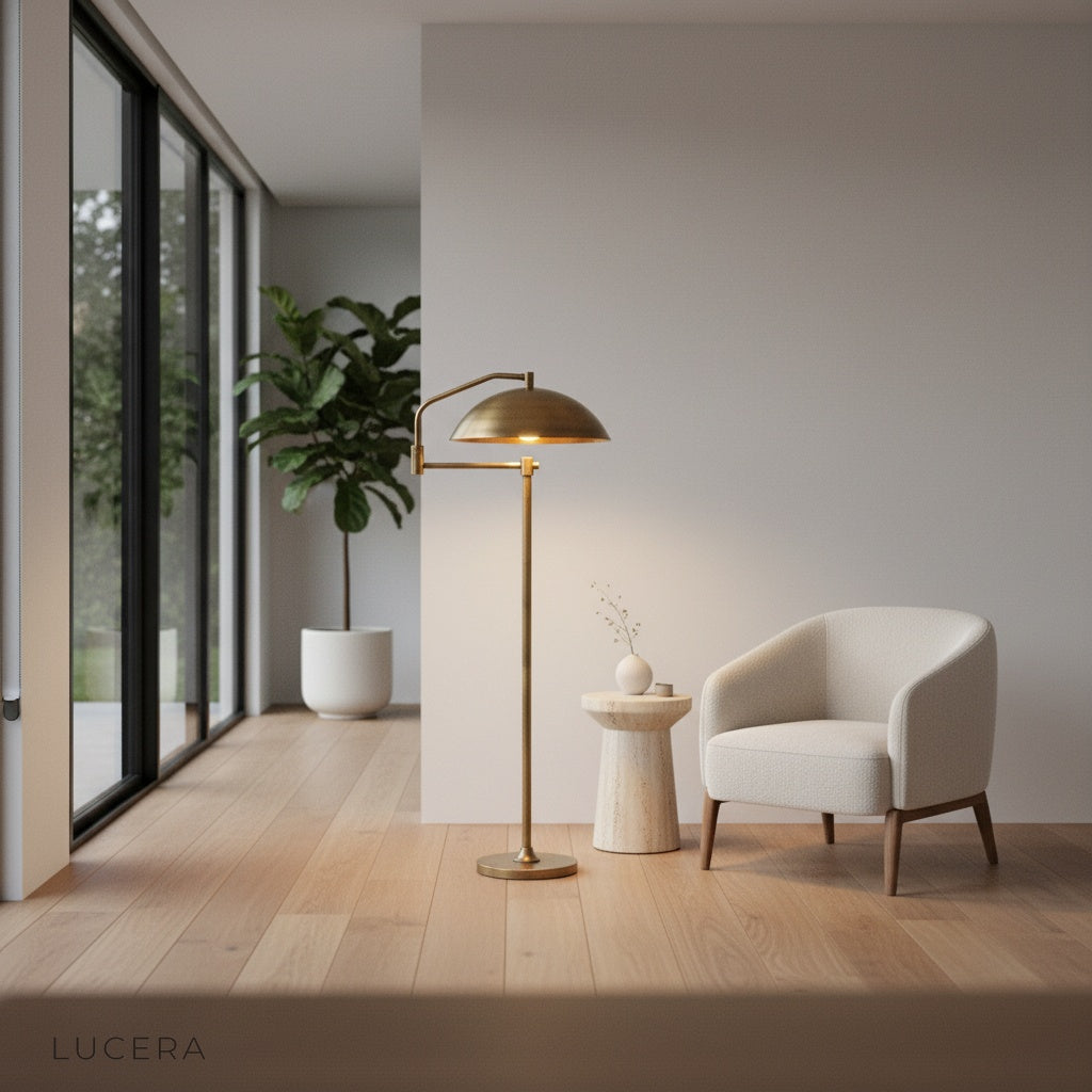 Caledon wide dome floor lamp next to sofa in minimalist interior