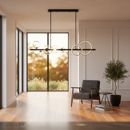 Mare pendant light casting soft light over minimalist hallway with gold accents
