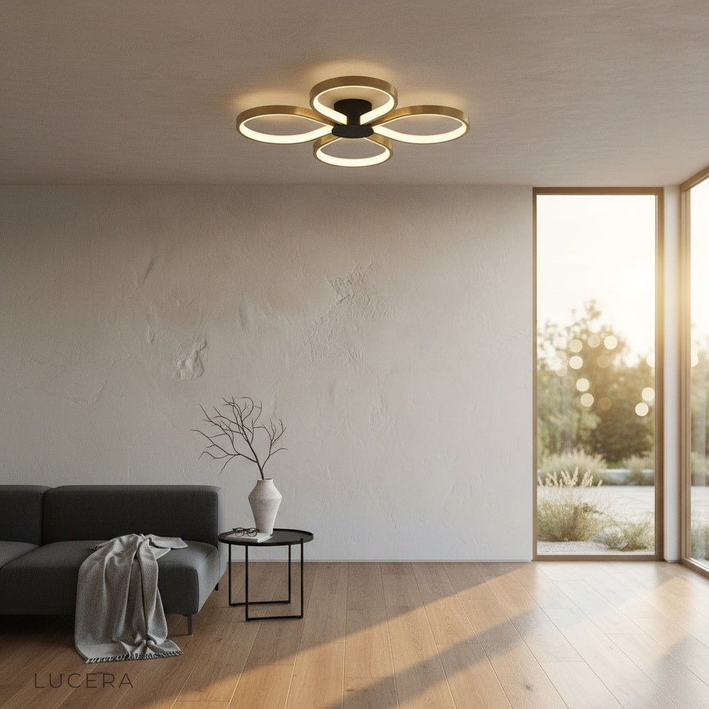 four-ring LED ceiling light in a bright hallway with minimalist decor and soft shadows