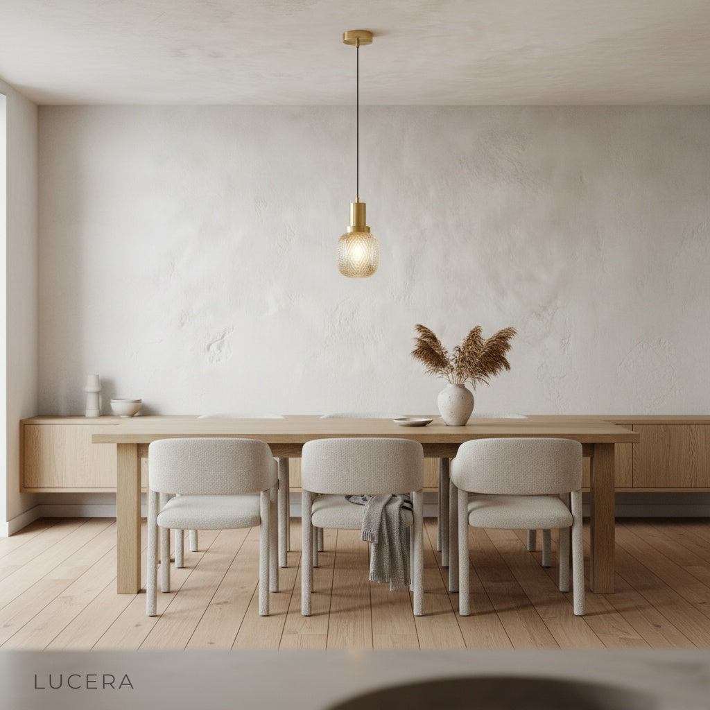 Silvia pendant light casting warm ambient glow in cozy evening bedroom setting