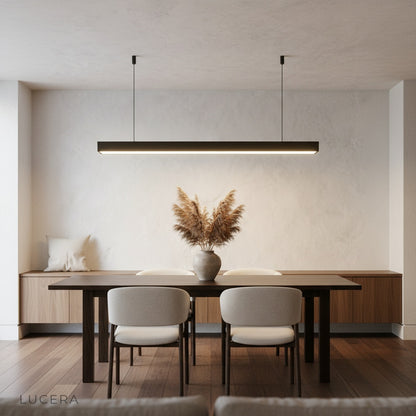 Winslow Pendant Light ambient evening shot casting warm light in office workspace