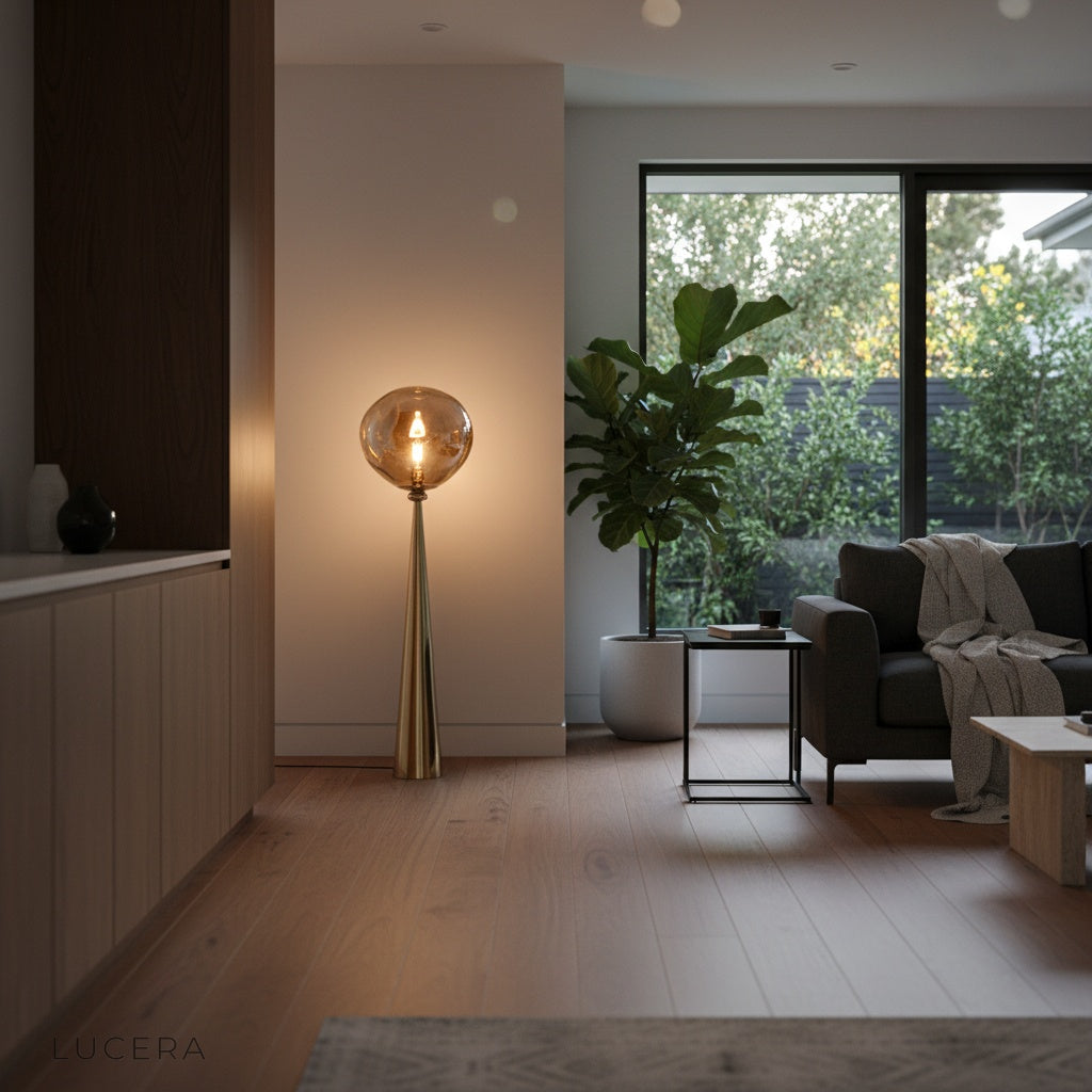 Bastion floor lamp beside armchair in bright daytime interior