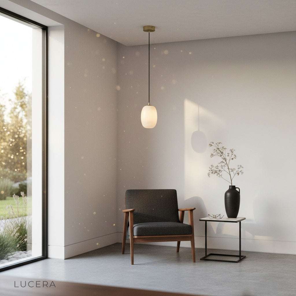 Embellish Alabaster pendant light casting ambient evening shadows in a stylish hallway entryway