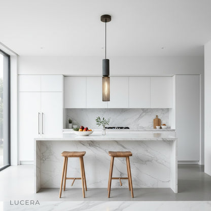 Ridge Pendant Light casting ambient evening glow over a cozy living room corner with industrial decor accents